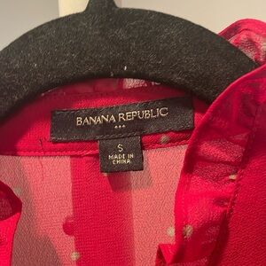 Sheer red lightly polka dotted blouse by Banana Republic, size Small.